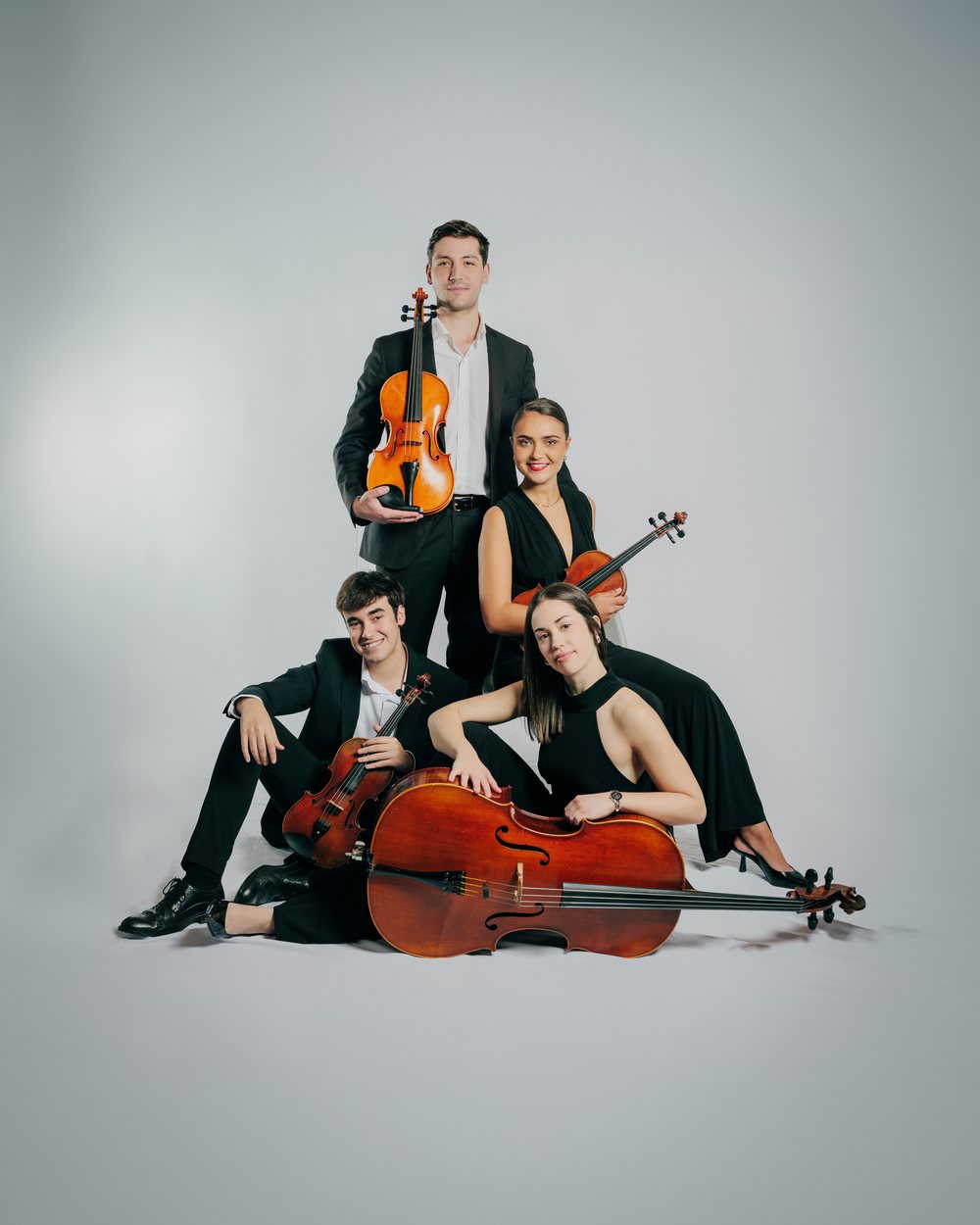 Músicos de cuarteto ensayando